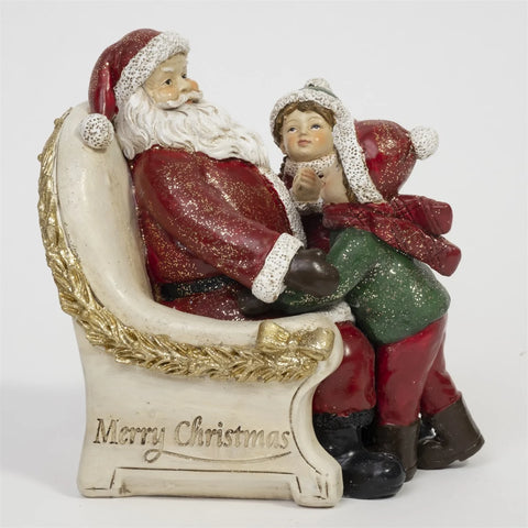 Santa In a Chair Christmas Figurine