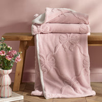CATHERINE LANSFIELD Carved Bow Sherpa Throw - Pink