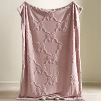 CATHERINE LANSFIELD Carved Bow Sherpa Throw - Pink