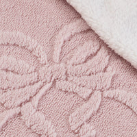 CATHERINE LANSFIELD Carved Bow Sherpa Throw - Pink
