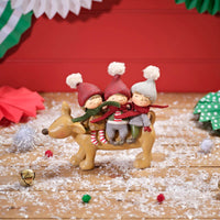 LANGS Furry & Festive Children sitting on a Dog Figurine 19x17cm