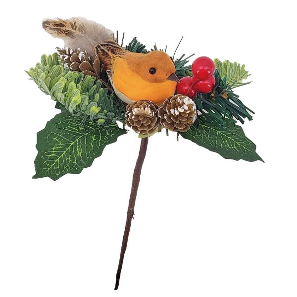 An artificial Christmas robin decoration on a stem, featuring a plush orange bird, green pine branches, dark green leaves, pinecones, red berries, and a feather, isolated on a white background.