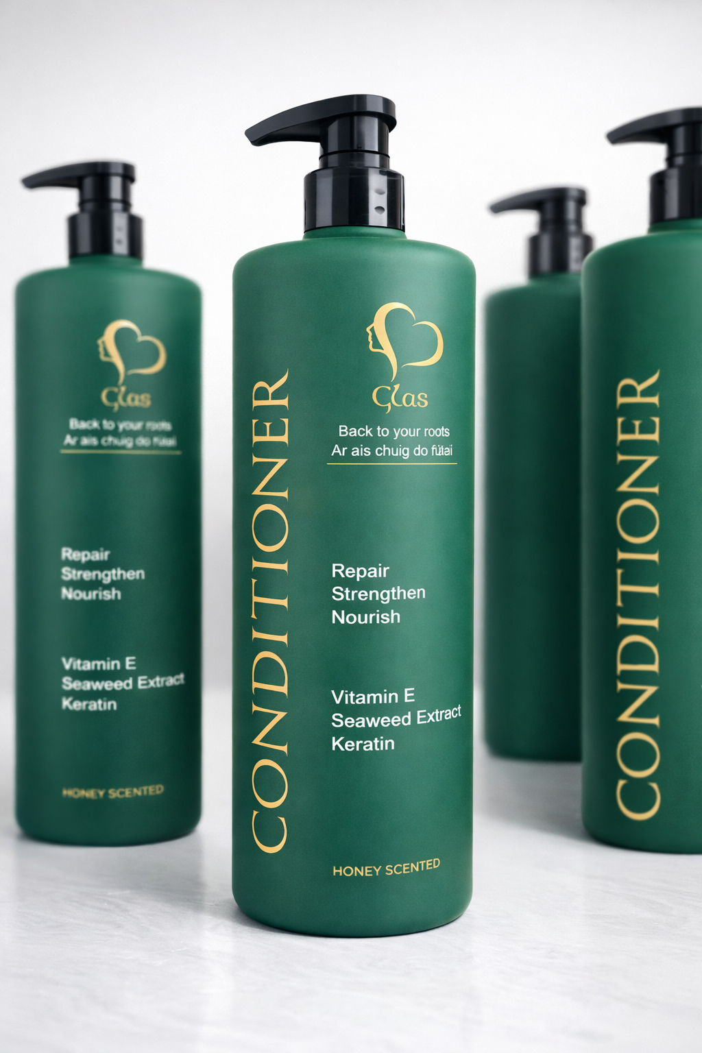 Green conditioner bottles with pump dispensers on a white background